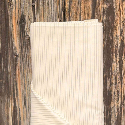 Tissu Coton brodé écru et bleu marine