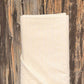 Tissu Coton brodé écru et bleu marine